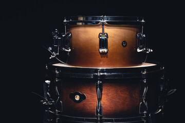 Fototapeta na wymiar Drums on a dark background isolated, percussion instruments.