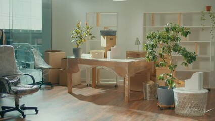 Workers of Moving Company With Uniforms Carefully Carrying Furniture. Team of Employee Workers Helps Customers to Relocation. Local Moving Services