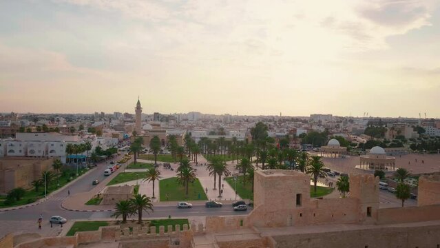 Large view shot from Ribat of Monastir to the city landscape. Mausoleum of Habib Bourguiba viewed from the fortress. Holiday concept.