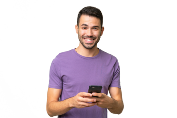 Young handsome caucasian man over isolated background sending a message with the mobile