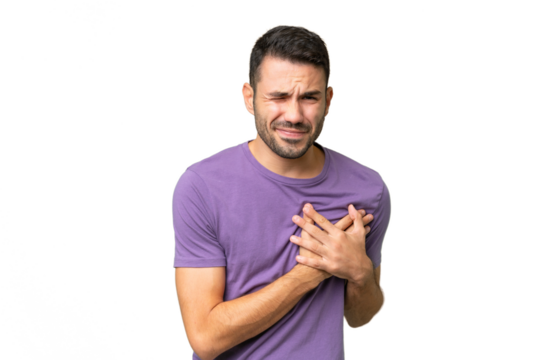 Young handsome caucasian man over isolated background having a pain in the heart