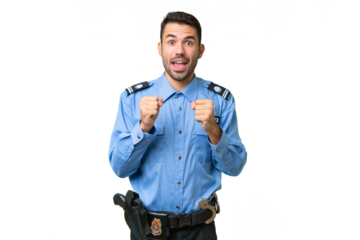 Young police caucasian man over isolated background celebrating a victory in winner position
