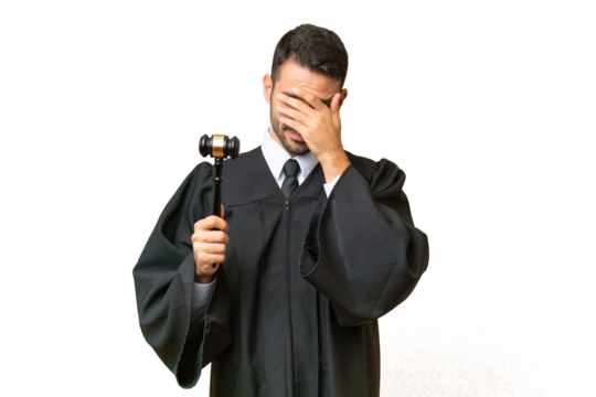 Judge caucasian man over isolated background with tired and sick expression