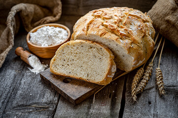 Fresh homemade bread on a wooden table