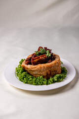 popular special wok fried sweet and sour pork ribs with deep fried yam ring on white wood table asian chinese banquet meat menu for restaurant 