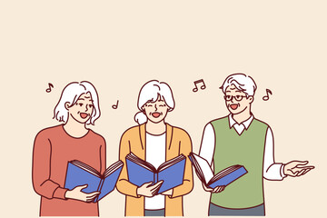 Chorus elderly men and women with workbooks in hands singing song together and enjoying old age. Gray-haired people from ensemble sing doing favorite hobby or giving musical concert - obrazy, fototapety, plakaty