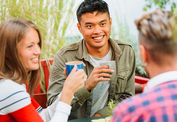 Diverse friends having coffee break together