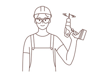 Repairman with drill in hands 