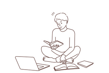 Man study with books and laptop 