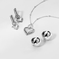 Elegant jewelry set. Jewellery set with gemstones. Jewelry accessories collage. Product still life...