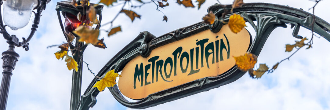 Sign at the entrance of a metro station in Paris in Autumn