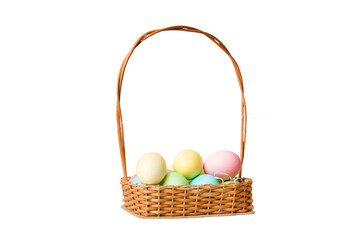 Basket of colorful Easter eggs isolated on white background. Easter basket filled with colored eggs top view holiday concept