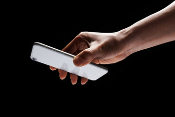 someone is making a payment with their phone On a black background