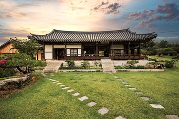 Traditional South Korean temple dancheong in the brilliant sunset.