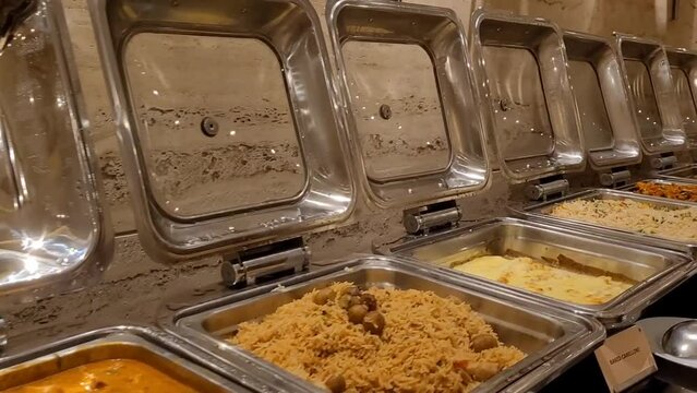 Hot and spicy Indian curries, rice, dhal, bread and other dishes ready for buffet dining