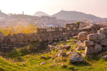 Plovdiv, Bulgaria sunset cityscape view of city and the ruins of the old fortress Nebet Tepe