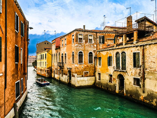 Fototapeta na wymiar View of water street and old buildings in Venice, ITALY 