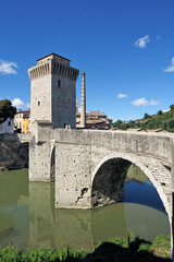 Obraz premium Metauro river, roman bridge, medieval tower, Fermignano, district of Pesaro and Urbino, Marches, Italy, Europe