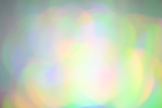 colorful abstract soft blue pink yellow blur rainbow bokeh gradient background. multicolored glowing summer texture