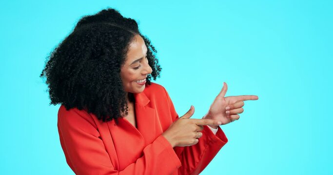 Business, woman and pointing on green screen with product placement in studio with blue background. Mockup, space and excited person showing announcement, information or promotion with happy smile.