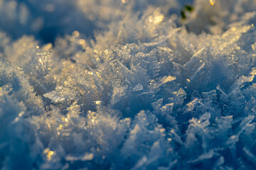 Fototapeta na wymiar Close up image of snow crystals in sunlight