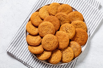 sweet soft ginger cookies on plate, top view