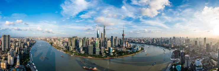 Deurstickers Aerial view of Shanghai city skyline and modern buildings at sunset, China. Panoramic view. © ABCDstock