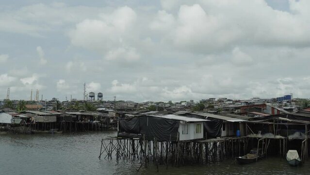 Wide shot of stilt houses in a poor area of Buenaventura at Colombia's Pacific Coast