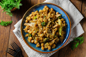 Quinoa with Chickpea, Mushrooms, and Broccoli, Healthy Meal, Vegetarian Food, Rustic Background