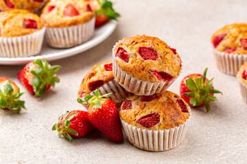 Close-up of strawberry banana muffins or cupcakes. Fruit homemade sweet bakery, pastry. Selective focus.