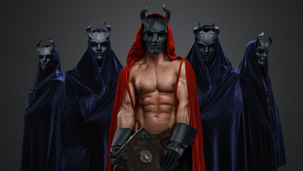 Portrait of Esoteric brotherhood in dark fantasy style dressed in robes and horned masks.