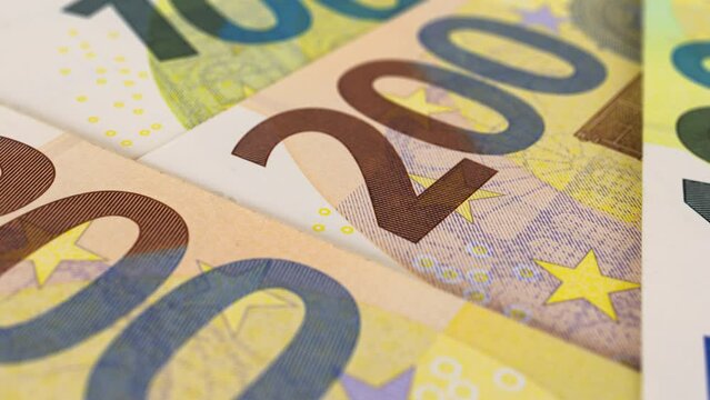 Euro banknotes close-up. European paper money, extreme macro dolly shot