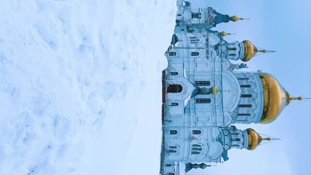 Belogorsky St. Nicholas Orthodox Missionary Monastery. Russia, Perm Krai, Belaya Gora. The temple on the hill in winter. Monastery on the background of snow. 4K