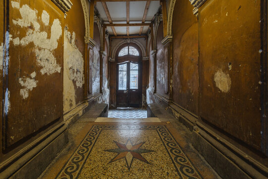 Entrance hall in old abandoned mansion