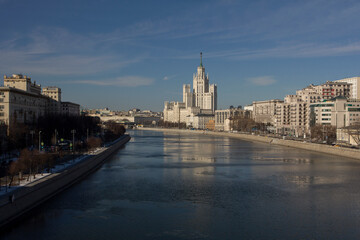 Obraz premium Stalinist architecture of the Soviet era. Popular landmark in Moscow. Stalin's skyscraper on Kotelnicheskaya embankment. Postcard view.