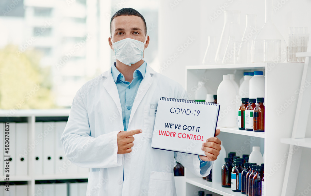 Poster Science will save the day. a young scientist holding a sign with Weve got it under control on it in a laboratory.