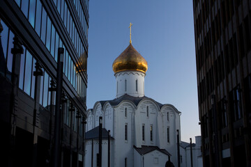 Old Believer Orthodox Church with a golden dome at sunset. Temple of St. Nicholas at Tverskaya Zastava in Moscow.