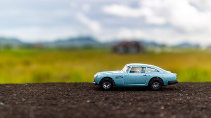 Fototapeta na wymiar minahasa, Indonesia : January 2023, toy car in the rice field