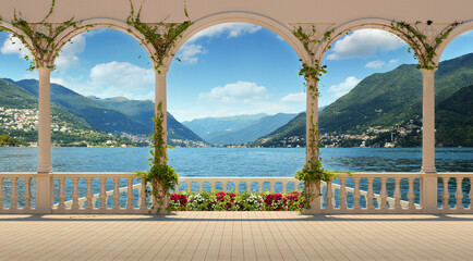 Beautiful view from the terrace over Lake Como and the mountains. Terrace with columns and balustrade of a Mediterranean palazzo on a sunny day. - obrazy, fototapety, plakaty