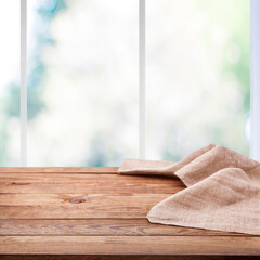 Stylish and Versatile Rustic chic: Use This Wooden Table and Napkin for Any Marketing Material. Wrinkled tablecloth close up top view mock up perspective.