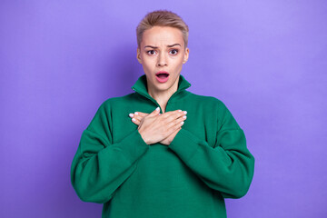 Photo of impressed shocked woman dressed green pullover arms chest open mouth isolated purple color background - obrazy, fototapety, plakaty