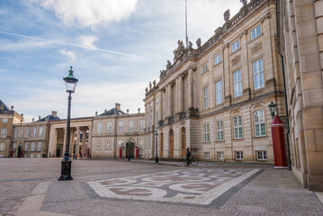 Fototapeta na wymiar Amalienborg Palace, the residence of the Danish royal family, in the center of Copenhagen, Denmark
