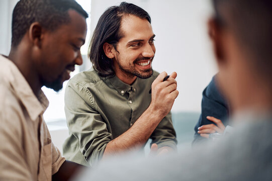 Listening is a part of success. a diverse group of businesspeople sitting together and having a meeting in the office during the day.