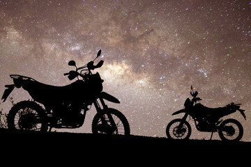 Fototapeta na wymiar Motocross silhouette with beautiful Milky Way