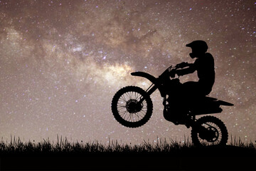 Motocross silhouette with beautiful Milky Way