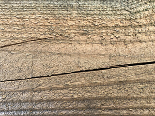 Brown aged rough wooden textured as a background