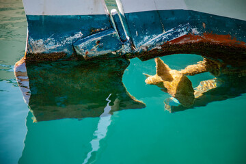 boat propeller on the water © ELEFTHERIOS