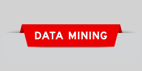 Red color inserted label with word data mining on gray background