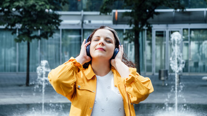 Outdoor portrait of Woman in headset in sound healing therapy. Healing Sounds and Sound Therapy....