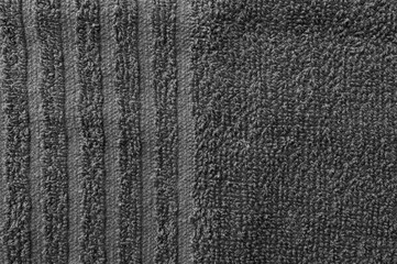 Gray terry towel fabric texture. Textile background, top view